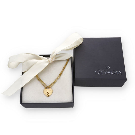 Colgante doble Corazón Partido en Plata de Ley 925 y baño Oro 18k