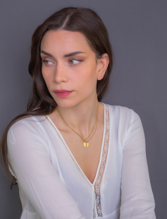 Colgante doble Corazón Partido en Plata de Ley 925