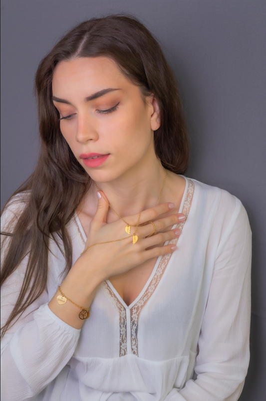 Colgante doble Corazón Partido en Plata de Ley 925 y baño Oro 18k