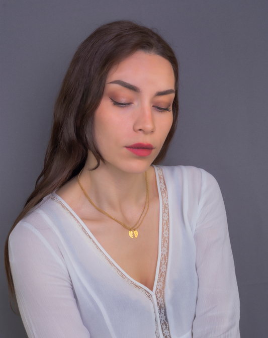 Colgante doble Corazón Partido en Plata de Ley 925 y baño Oro rosa 18k