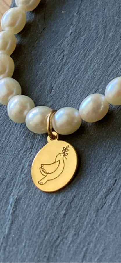 Pulsera de Perlas para Comunión con Medalla de Paloma en Plata 925